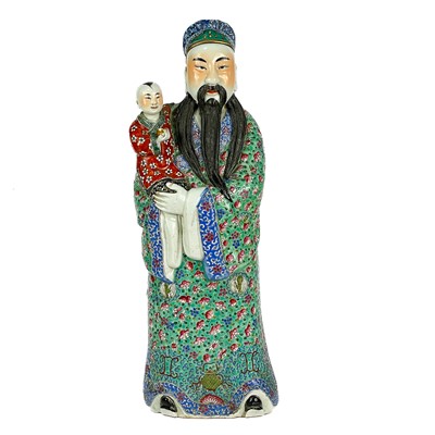 Lot 16 - Three Chinese famille rose porcelain figures of The Immortals, 20th century.