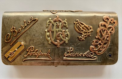 Lot 2463 - A Russian silver purse with applied gold in...