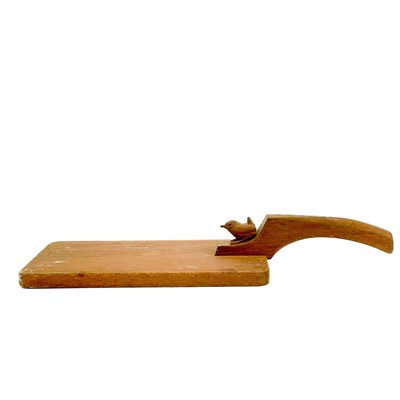 Lot 10 - A Bob Hunter Thrilby Wrenman oak cheeseboard.