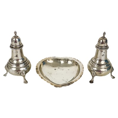 Lot 280 - A pair of George V silver baluster pepper casters.