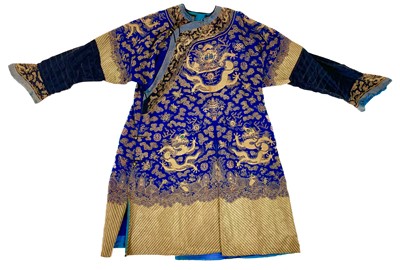 Lot 42 - A Chinese embroidered dragon robe, late 19th century.