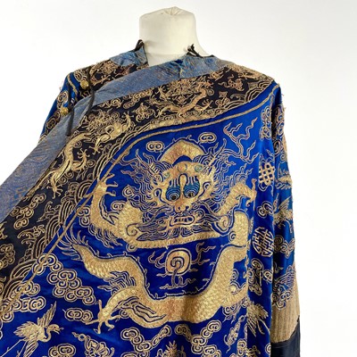 Lot 42 - A Chinese embroidered dragon robe, late 19th century.
