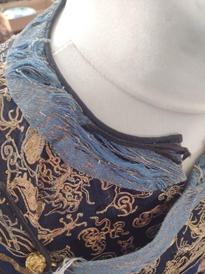 Lot 42 - A Chinese embroidered dragon robe, late 19th century.