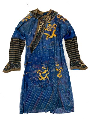 Lot 45 - A Chinese silk embroidered dragon robe, late 19th/early 20th century.