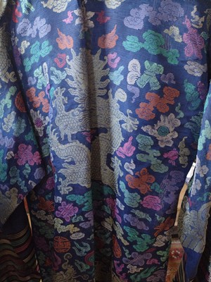 Lot 47 - A Chinese silk embroidered dragon robe, early 20th century.