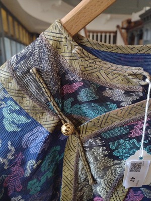 Lot 47 - A Chinese silk embroidered dragon robe, early 20th century.