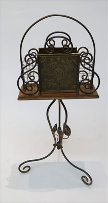Lot 252 - A Victorian Aesthetic Movement brass and oak...
