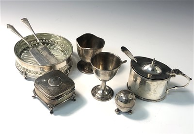 Lot 2023 - A pierced silver butter dish with cut glass...
