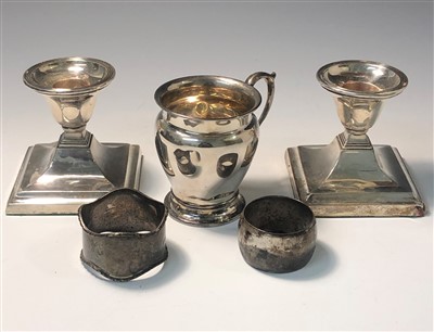 Lot 2025 - A small silver mug together with a pair of low...