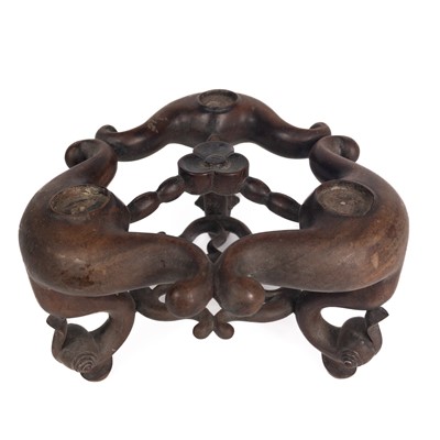 Lot 56 - An unusual Chinese carved hardwood stand, 19th century.