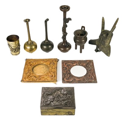 Lot 62 - A Chinese bronze candle holder, 19th century.