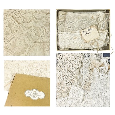 Lot 1609 - A length of fine length lace decorated with floral bouquets.