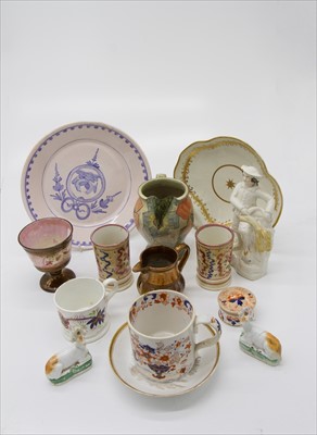 Lot 1416 - A Paul Jackson style jug, a porcelain saucer...
