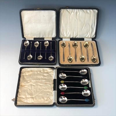 Lot 2045 - Three cased sets of silver coffee spoons.