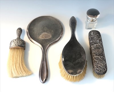 Lot 2054 - A dissimilar silver dressing table set.