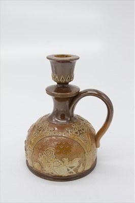Lot 1418 - An unusual Doulton Lambeth candle holder, the...