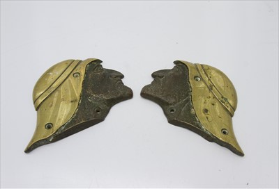 Lot 274 - A pair of cast metal wall plaques, mirror...