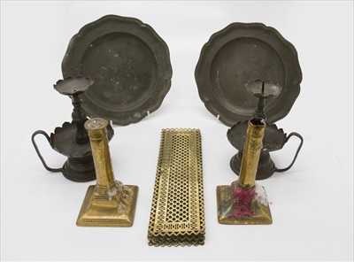 Lot 273 - A set of five pierced brass finger...