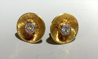 Lot 2441 - A pair of contemporary diamond set gold disc...