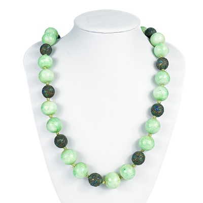 Lot 470 - A Chinese cloisonne and green speckled jadeite bead necklace.