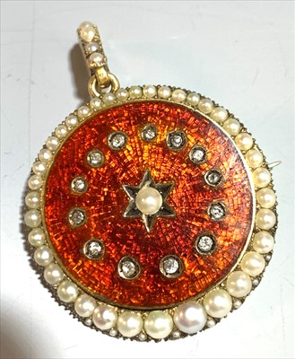 Lot 2447 - An Edwardian discus pendant with a crescent of...