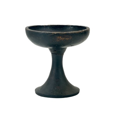 Lot 59 - An African tribal stem footed bowl.