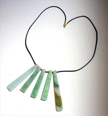 Lot 2450 - A Jade necklace.