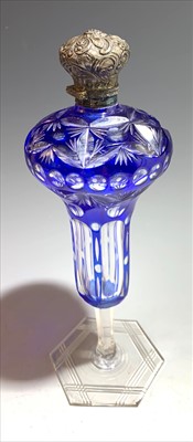 Lot 2451 - A perfume bottle.