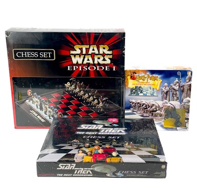 Lot 717 - Star Wars, Star Trek, Harry Potter themed mint boxed chess sets (x3)