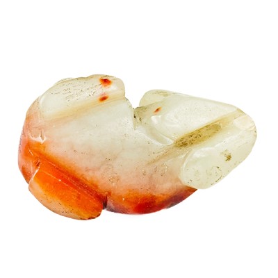 Lot 17 - Three Chinese caved jade animal figures.