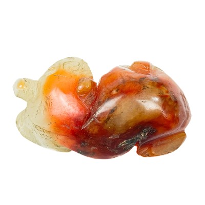Lot 17 - Three Chinese caved jade animal figures.