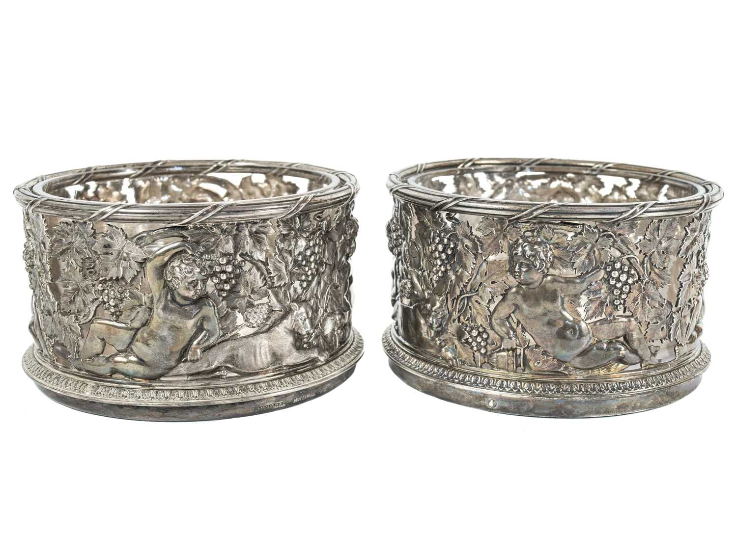 Lot 4 - An exceptional pair of Regency silver wine decanter stands by Philip Rundell.