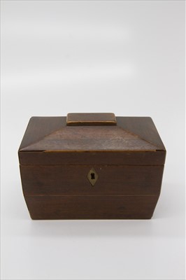 Lot 294 - A George III mahogany tea caddy of sarcophagus...