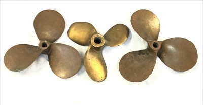 Lot 308 - Three brass ship's propellors, one stamped HH...