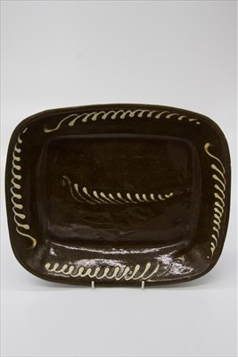Lot 1447 - A 19th century slipware dish with slip trailed...