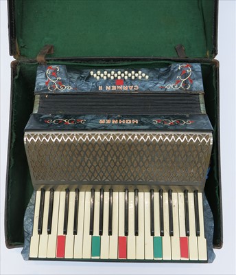 Lot 396 - A Hohner 'Carmen II' piano accordion, cased.