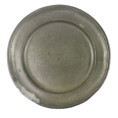 Lot 140 - A pewter plate marked 1759 inscribed with the owner's initials.