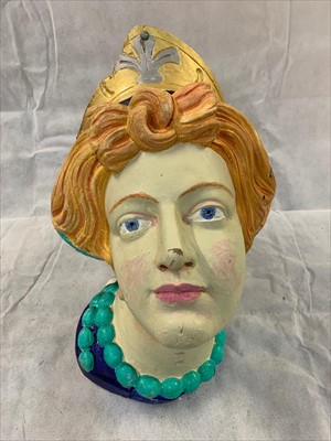 Lot 333 - A reproduction carved wood female head, of...
