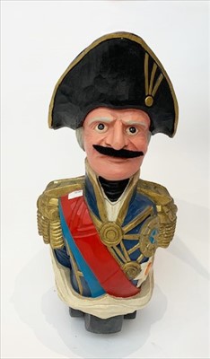 Lot 334 - A reproduction carved wood ship's figurehead,...