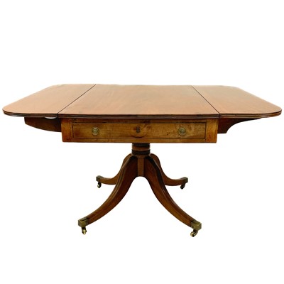 Lot 1882 - A Regency mahogany drop leaf table.