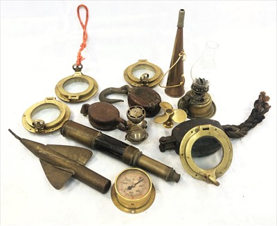 Lot 339 - A group of four brass portholes, three rigging...
