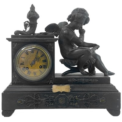 Lot 1703 - A  French black slate and bronze mantel clock.