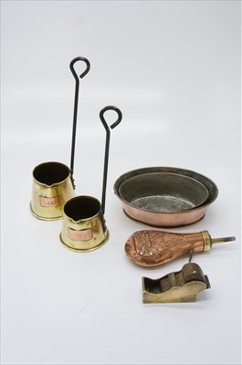 Lot 371 - A 19th century copper powder flask decorated...