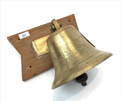 Lot 467 - A brass bell, with iron clanger, brass bracket...