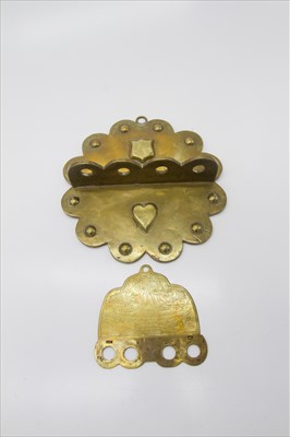 Lot 357 - A WWI period brass trench art pipe rack,...