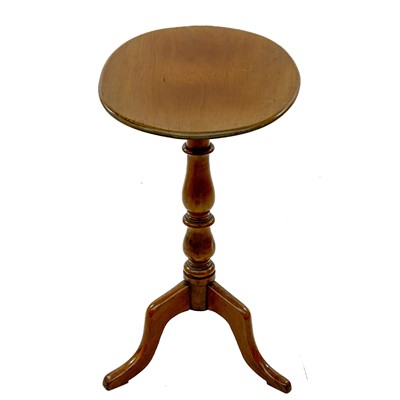 Lot 1926 - A Victorian fruitwood oval tripod table.