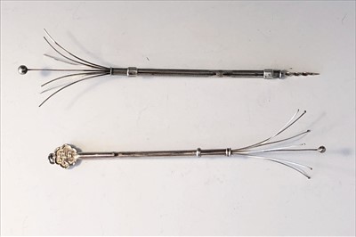 Lot 2064 - A Chinese silver propelling swizzle stick...