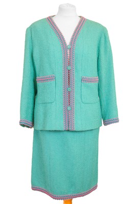 Lot 590 - A Chanel Boutique turquoise Scoubidou 1994 collection dress suit with braided trim.