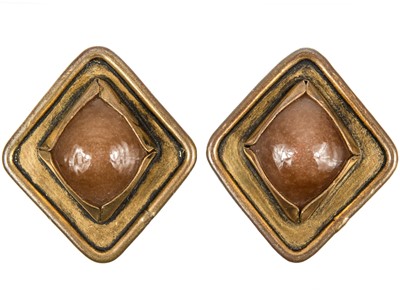Lot 600 - A Chanel pair of 1960's brown Gripoix clip earrings.