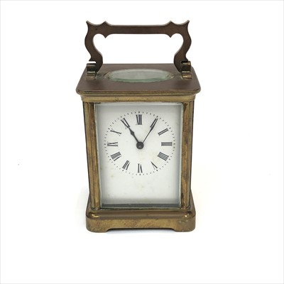 Lot 3030 - A brass cased carriage clock, inscribed to...